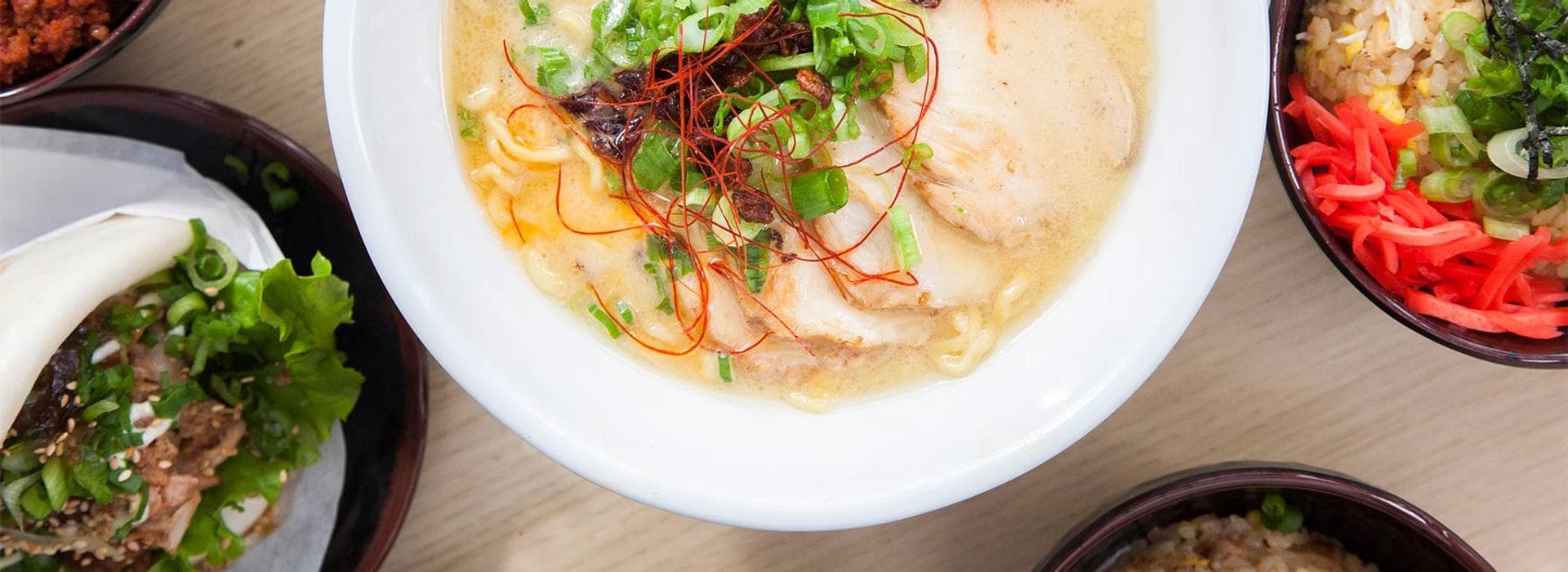 Tatsu Ramen menu spread featuring signature ramen bowls